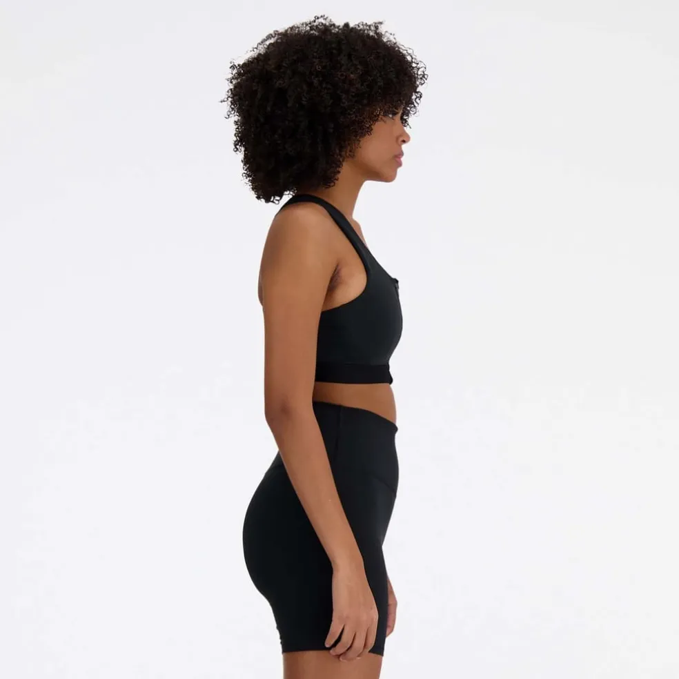New Balance Sleek Medium Support Pocket Zip Front Sports Bra in Black